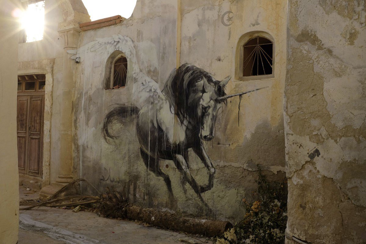 Hunt-Her-Street-Art-by-Faith47-in-Tunisia