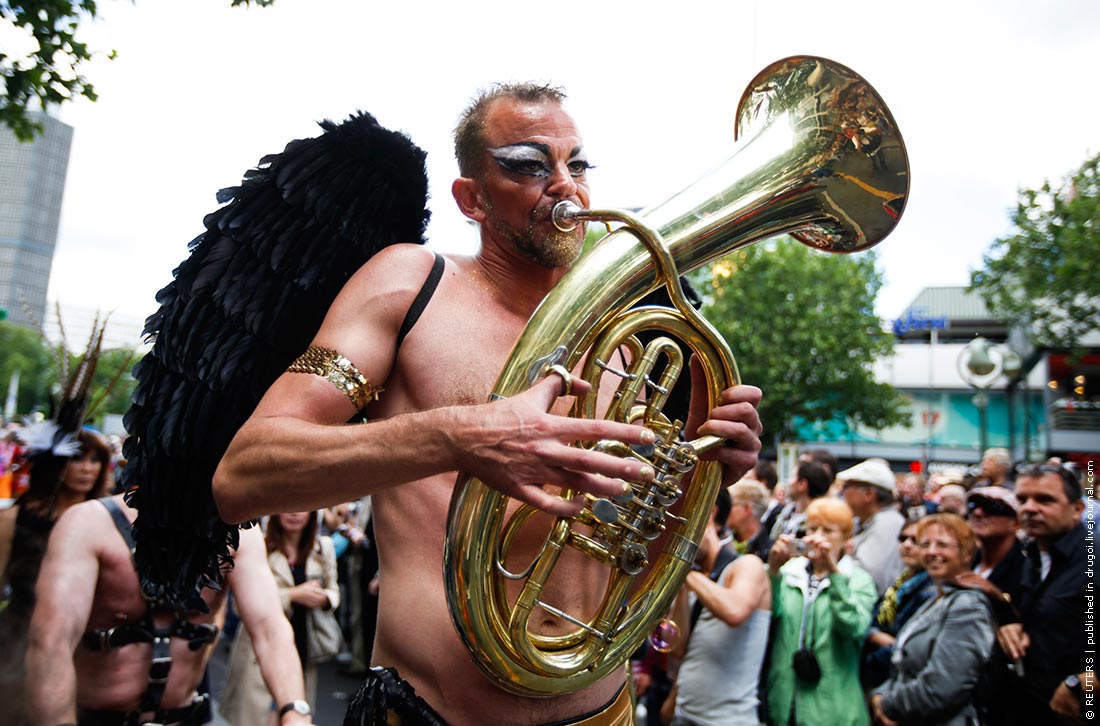 A reveller attends the Christopher Street Day parade in Berlin